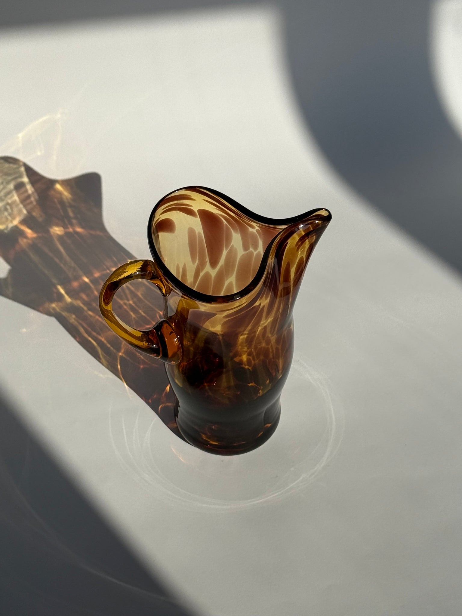 Mid century tortoiseshell Pitcher