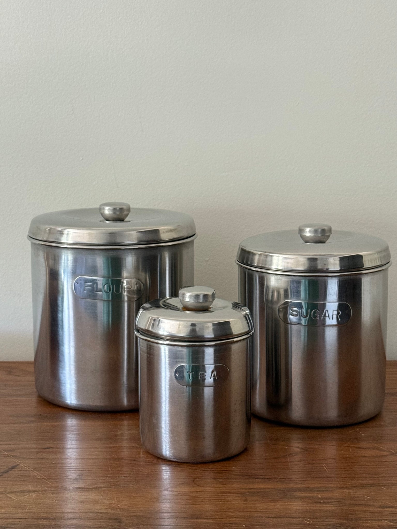Mid century stainless steel canister set
