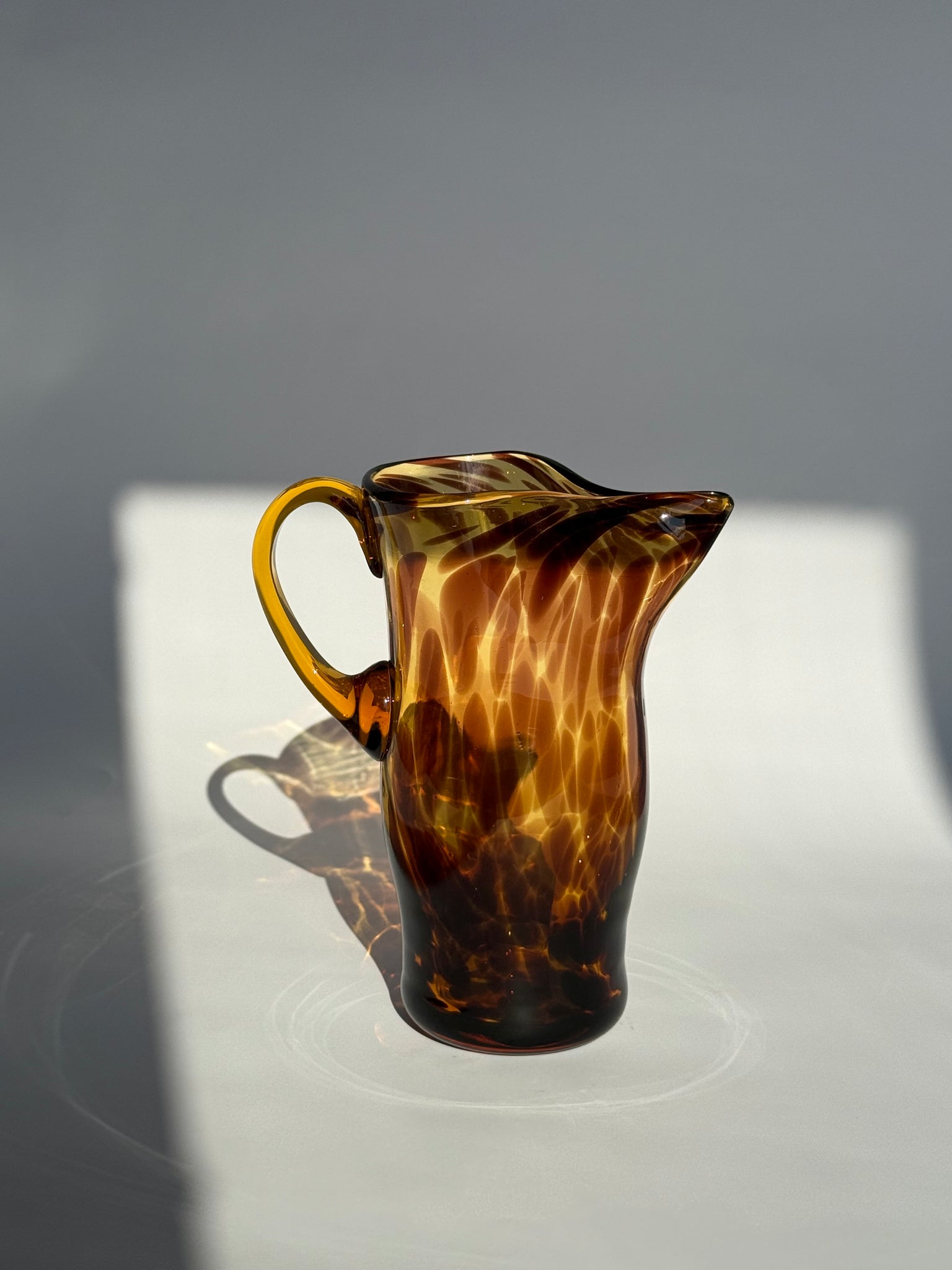 Mid century tortoiseshell Pitcher