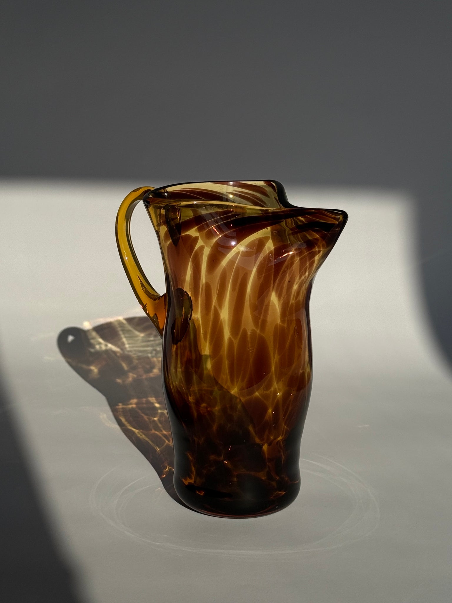 Mid century tortoiseshell Pitcher