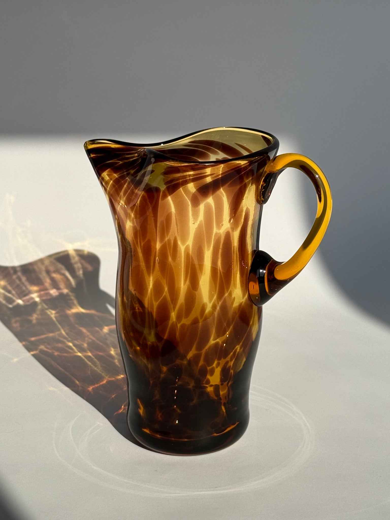 Mid century tortoiseshell Pitcher