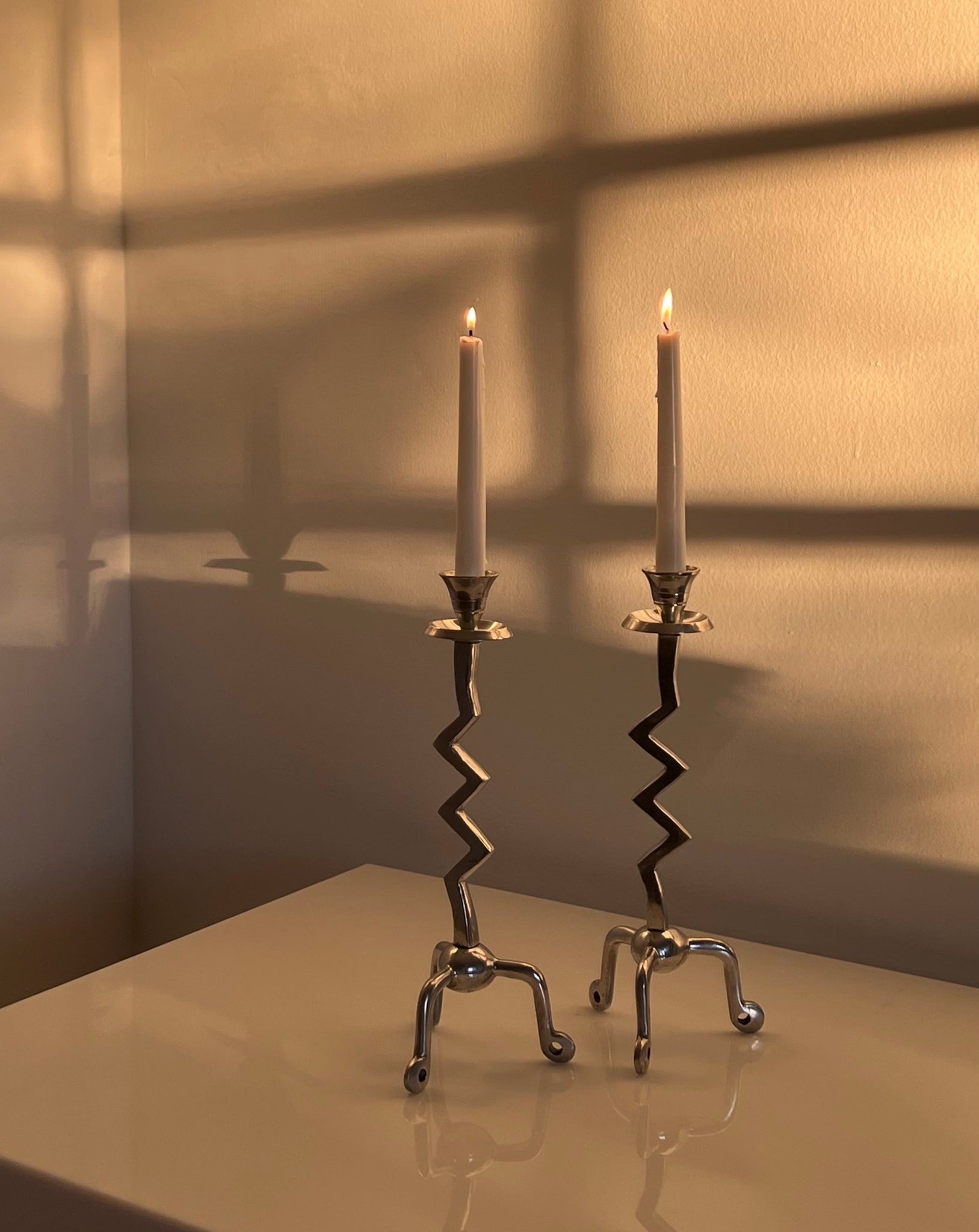 Post Modern Chrome Candlesticks