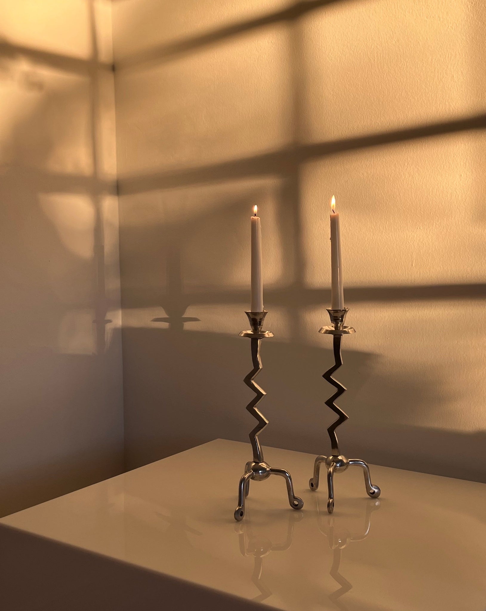 Post Modern Chrome Candlesticks