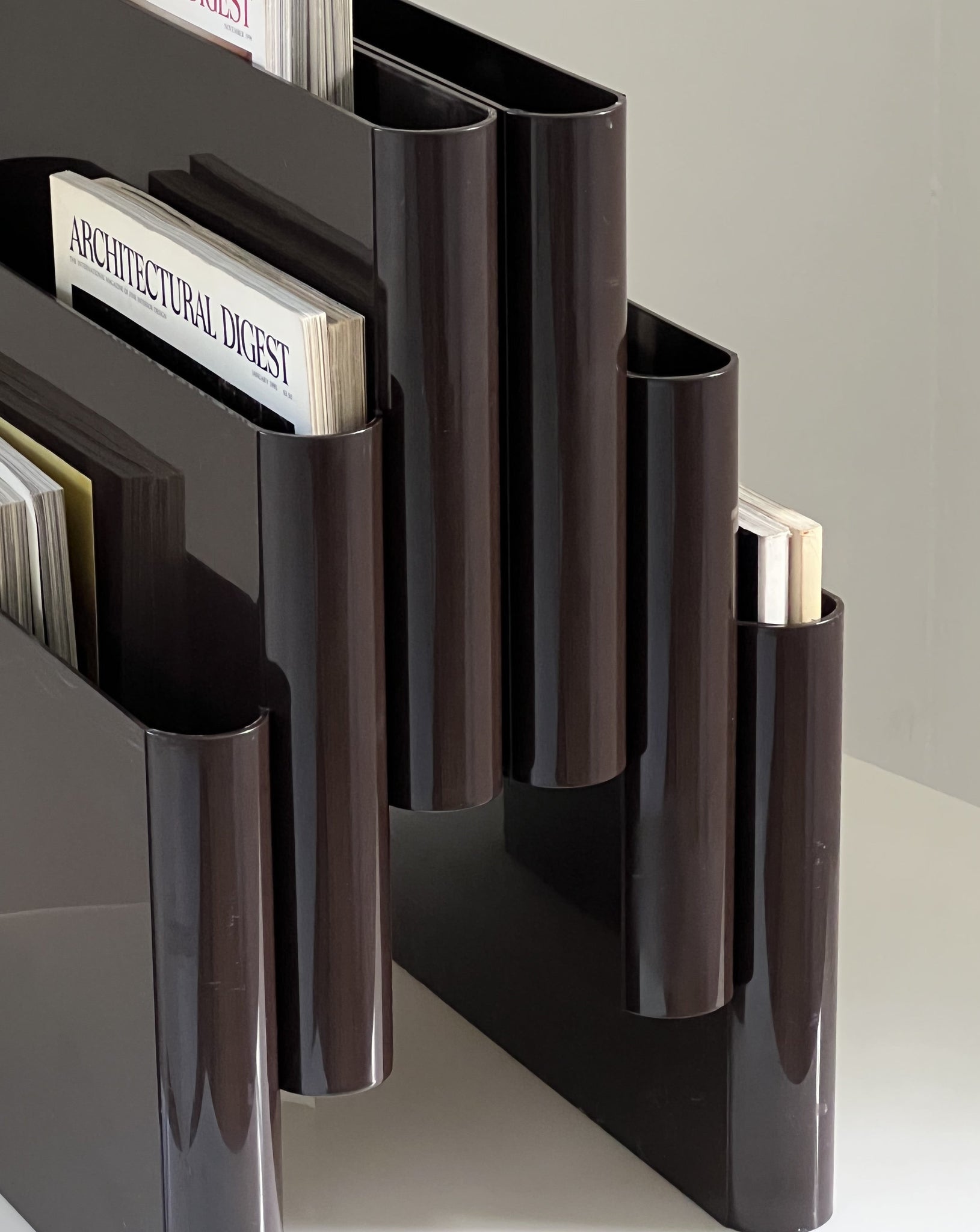 KARTELL MAGAZINE RACK BY GIOTTO STOPPINO