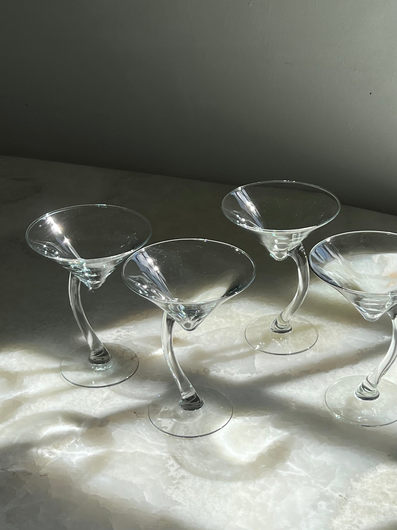 Curved martini glasses