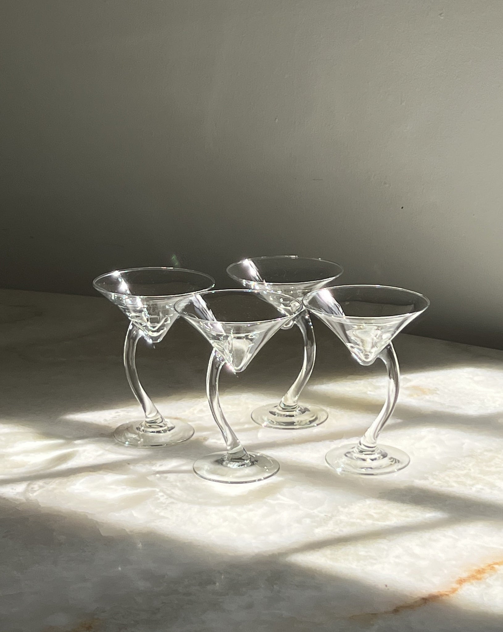 Curved martini glasses