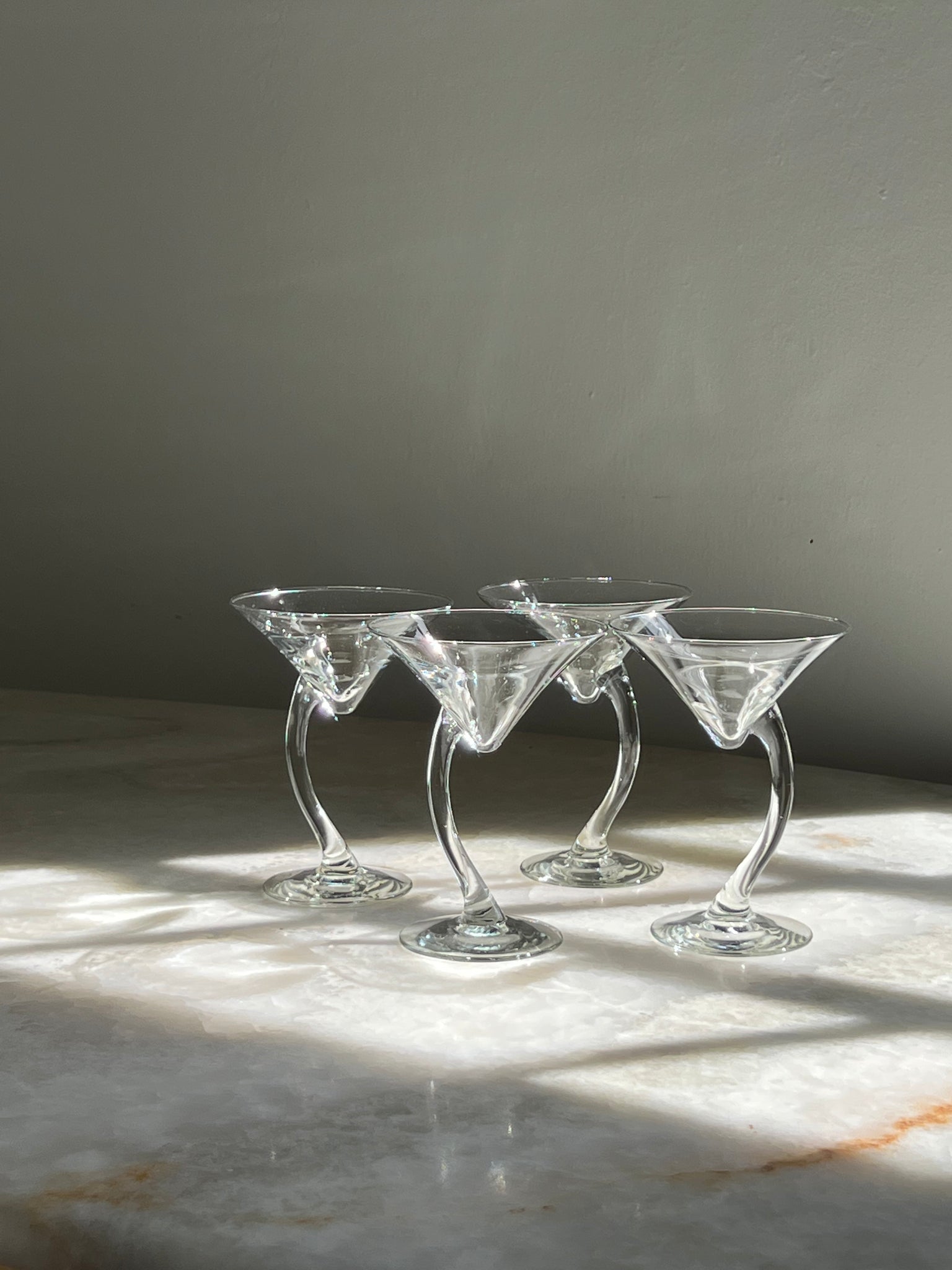 Curved martini glasses