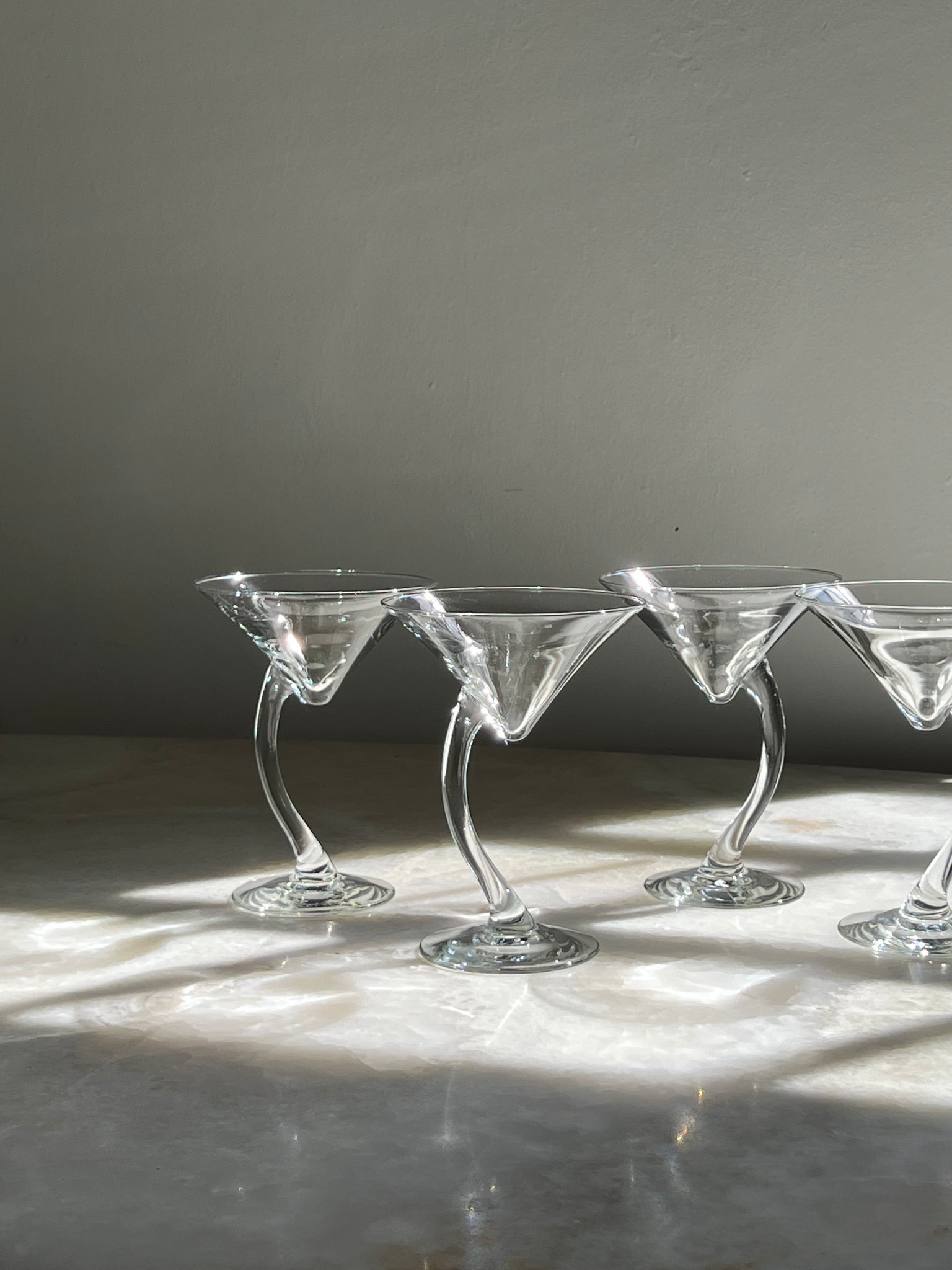 Curved martini glasses