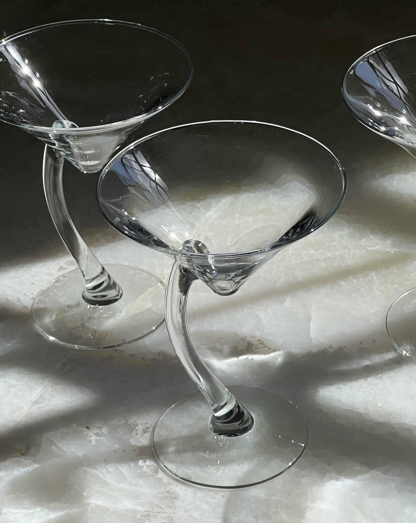 Curved martini glasses