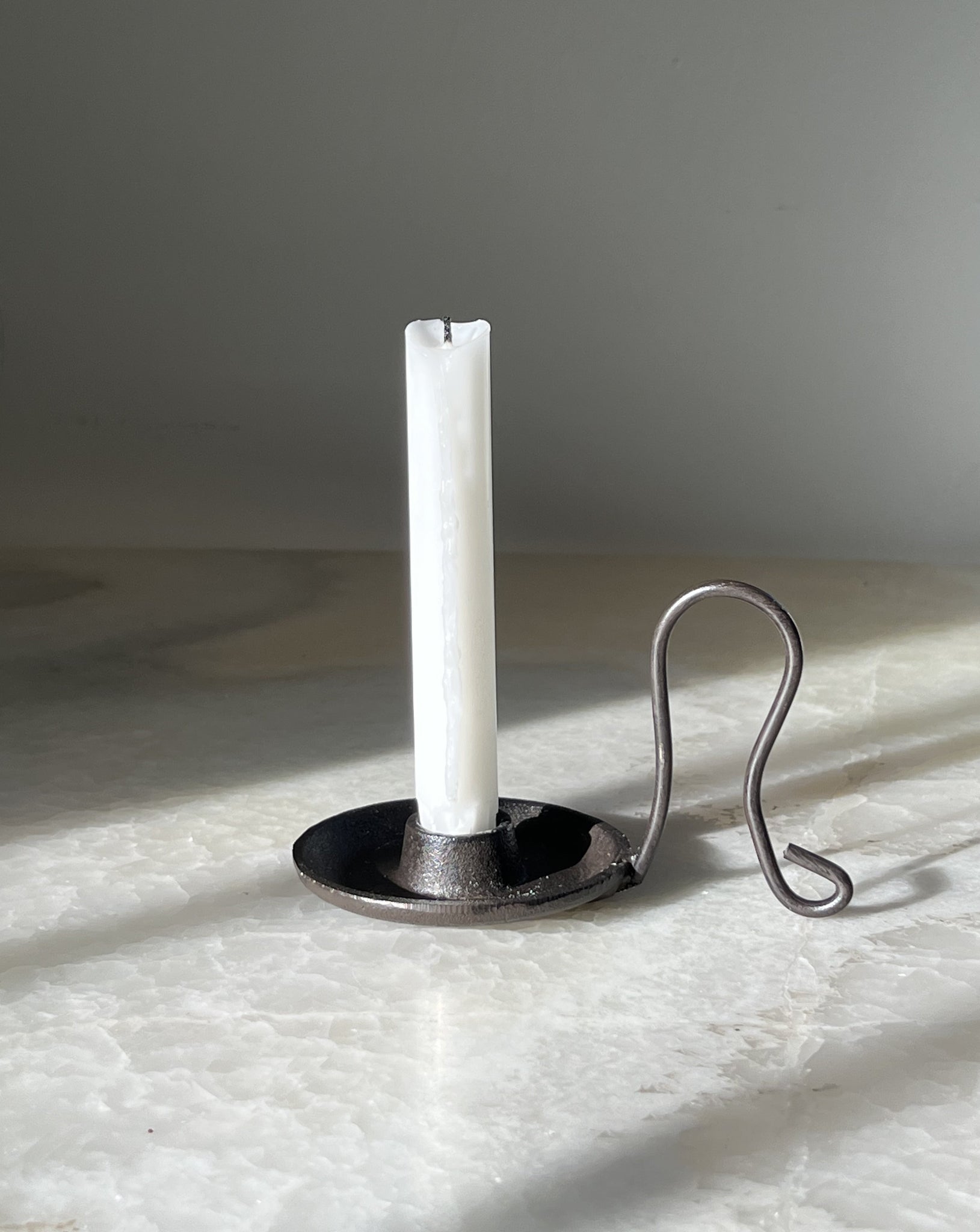Iron candle holder
