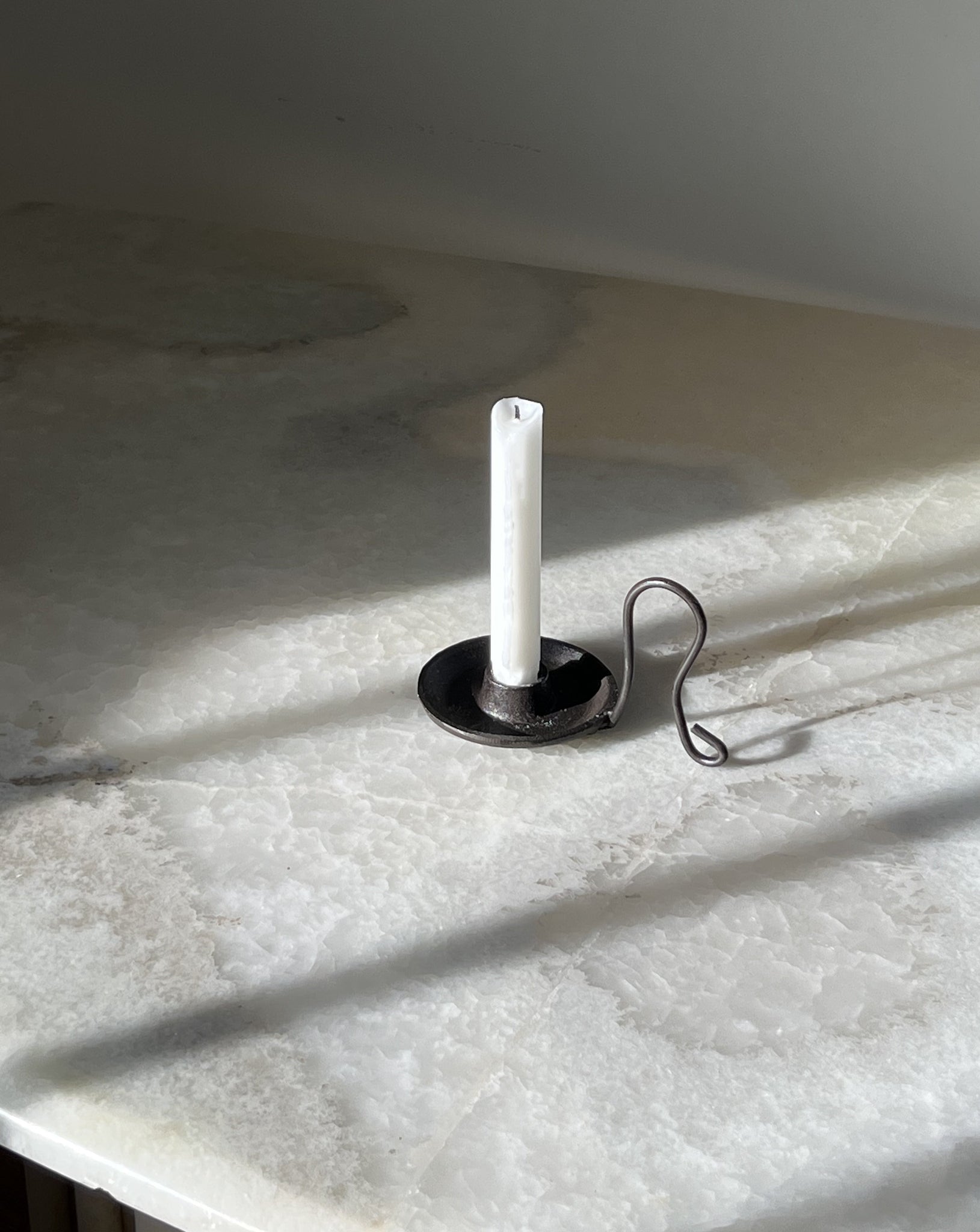 Iron candle holder